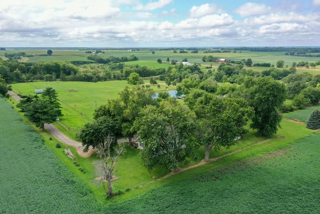 birds eye view of property with a rural view