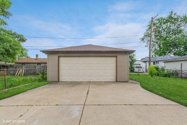 garage with a lawn