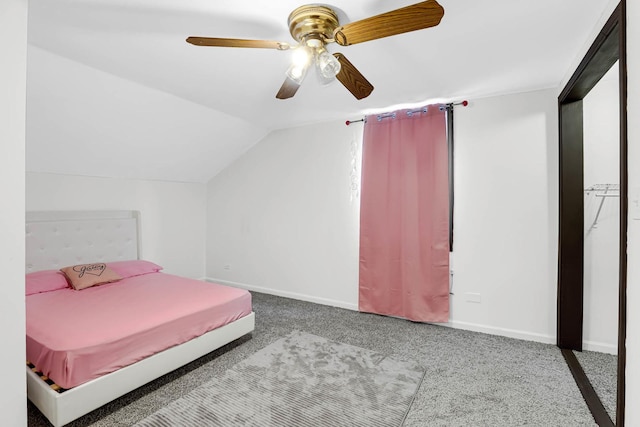 carpeted bedroom featuring ceiling fan and lofted ceiling