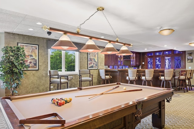 playroom with tile patterned floors, a drop ceiling, pool table, and bar