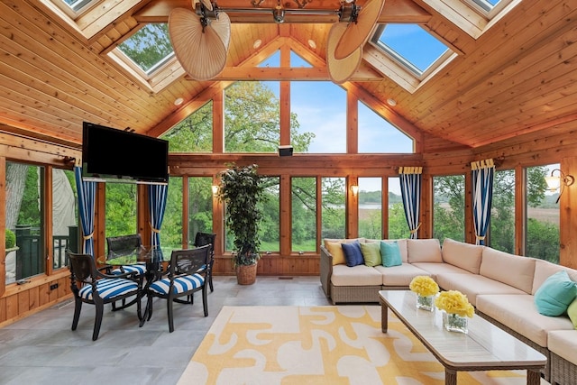 sunroom featuring wood ceiling and vaulted ceiling with skylight