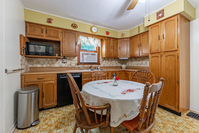 kitchen with brown cabinets, light countertops, visible vents, ceiling fan, and black appliances