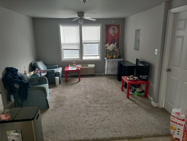 recreation room with an AC wall unit, carpet floors, electric panel, and ceiling fan