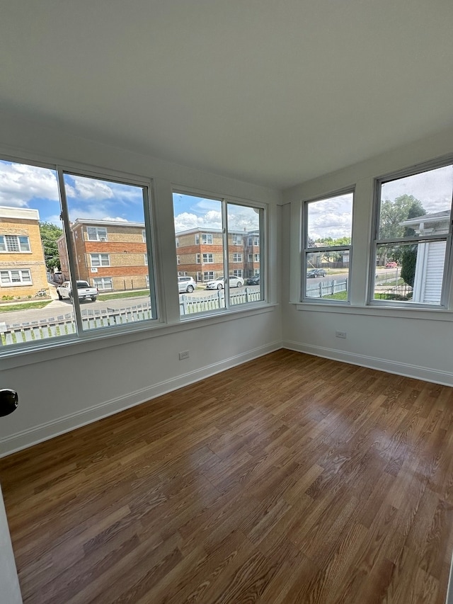 unfurnished sunroom with a healthy amount of sunlight