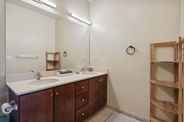 bathroom with vanity and tile patterned floors