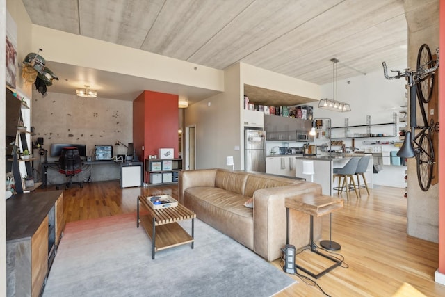 living room with light hardwood / wood-style floors