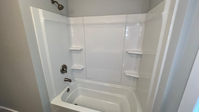 bathroom with shower / bathing tub combination