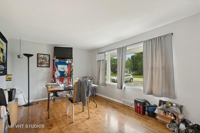 office area featuring hardwood / wood-style floors