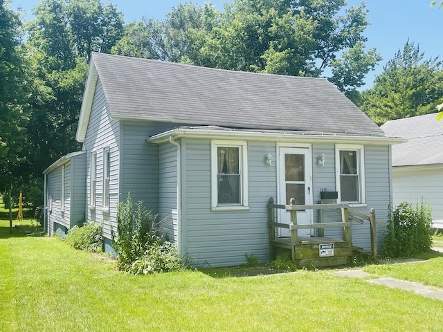 bungalow with a front yard