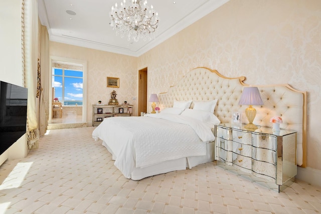 bedroom featuring an inviting chandelier and ornamental molding