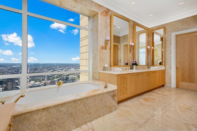 bathroom featuring crown molding, vanity, and a relaxing tiled tub