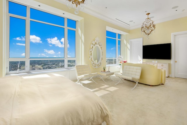 carpeted bedroom with an inviting chandelier and ornamental molding