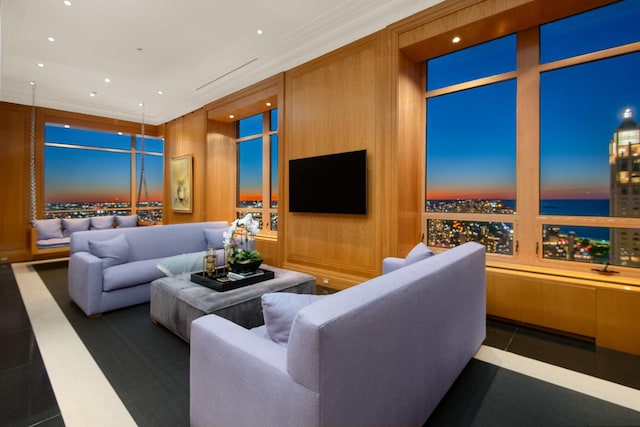 tiled living room featuring crown molding and wooden walls