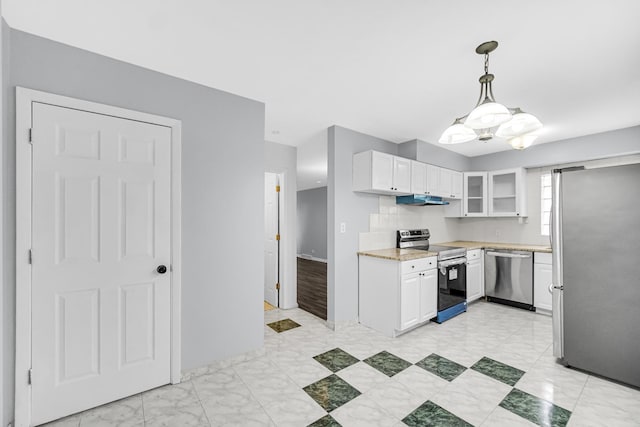 kitchen featuring white cabinets, appliances with stainless steel finishes, decorative light fixtures, and a notable chandelier