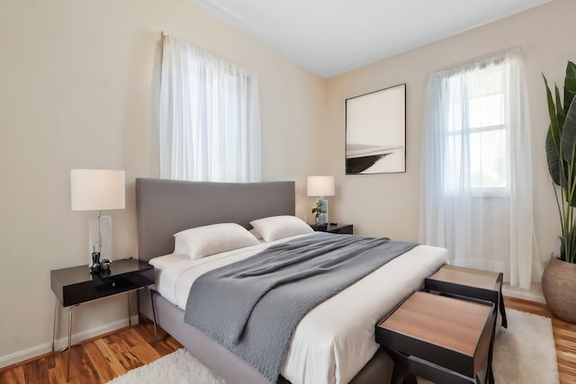 bedroom with light wood-type flooring