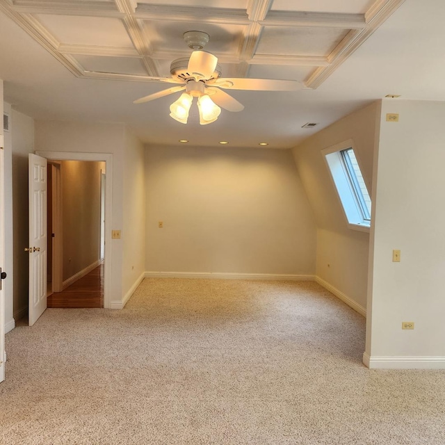 bonus room featuring ceiling fan and light colored carpet