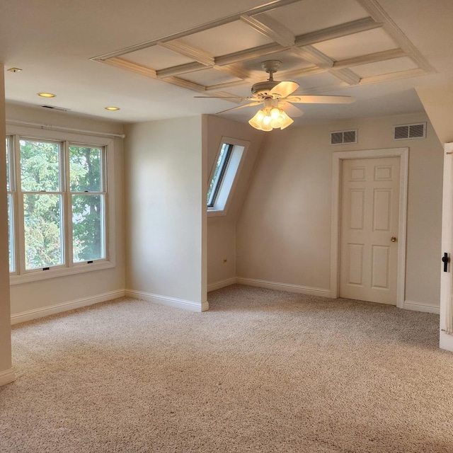 bonus room featuring ceiling fan and light colored carpet