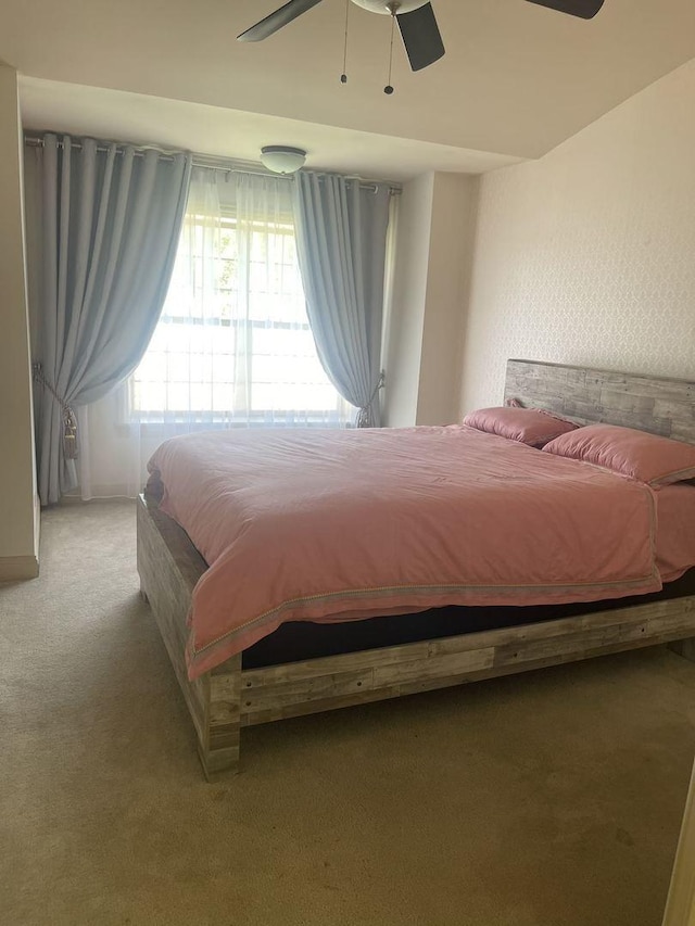 bedroom with carpet flooring and ceiling fan