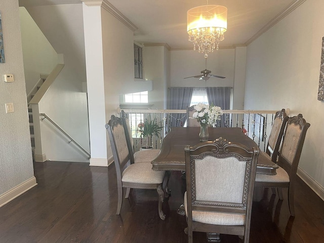 dining space featuring ceiling fan with notable chandelier, dark hardwood / wood-style floors, and ornamental molding