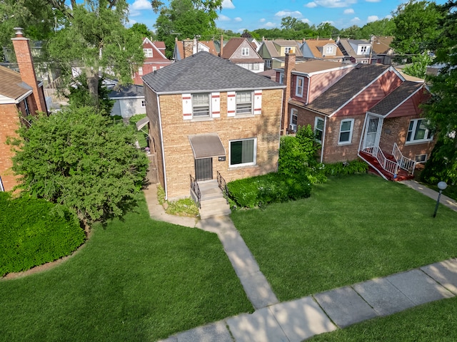 view of front of home featuring a front lawn