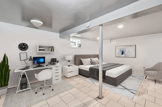 bedroom with light tile patterned floors