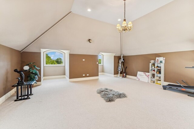 bonus room with carpet flooring, vaulted ceiling, and a chandelier