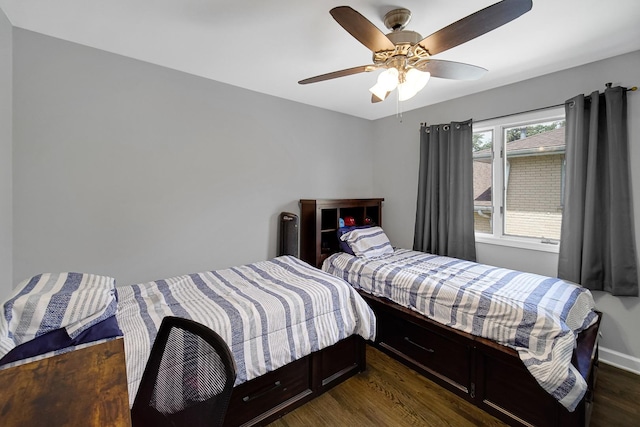 bedroom featuring dark hardwood / wood-style floors and ceiling fan