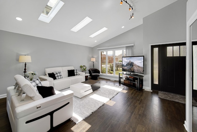 living room featuring dark hardwood / wood-style flooring and high vaulted ceiling