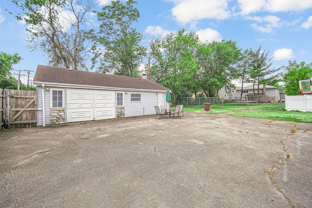 garage with a lawn