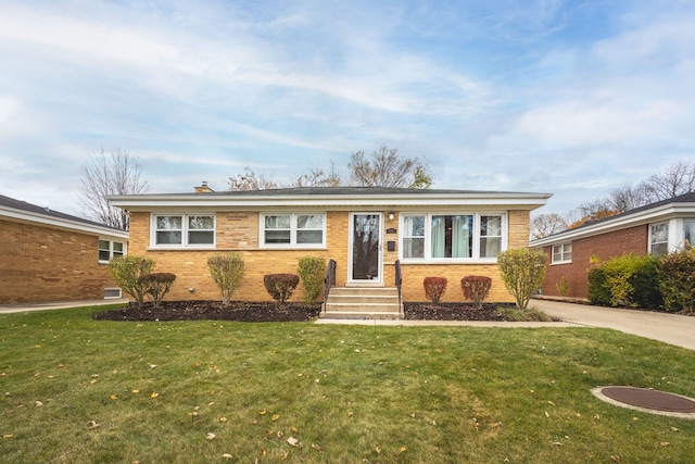 single story home with a front lawn, brick siding, a chimney, and entry steps