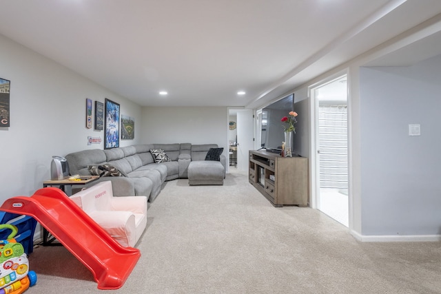 living room with carpet flooring, baseboards, and recessed lighting