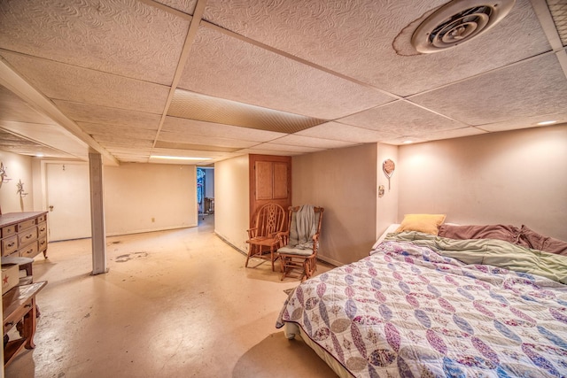 bedroom featuring a drop ceiling