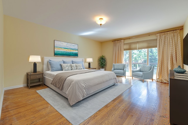 bedroom with light hardwood / wood-style flooring