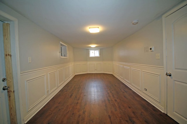 basement featuring dark wood-type flooring