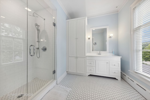 bathroom with ornamental molding, vanity, walk in shower, and a baseboard heating unit