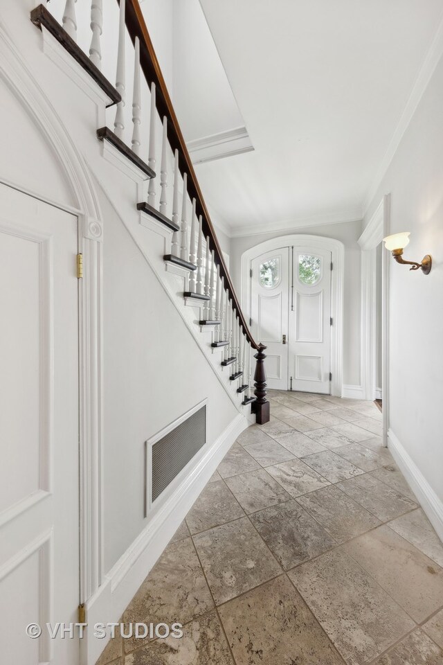 entryway with ornamental molding