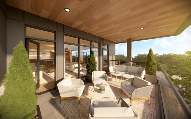 exterior space with a balcony and an outdoor hangout area