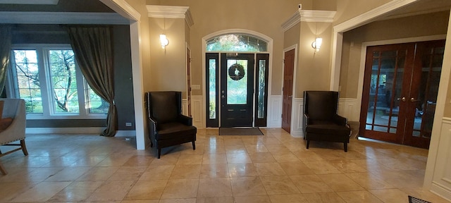 entryway with plenty of natural light and light tile flooring