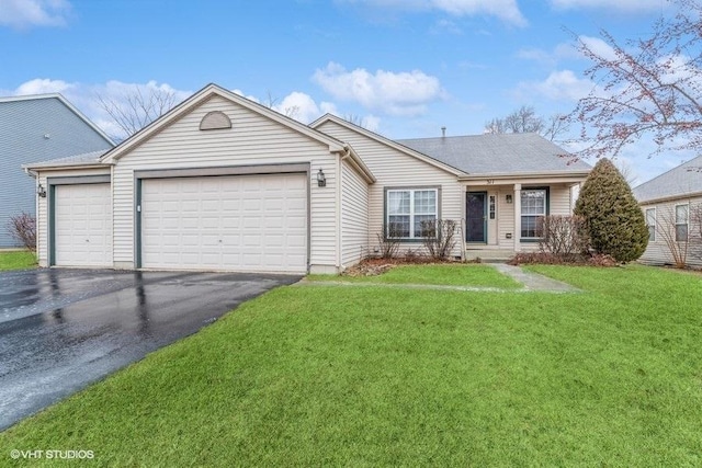 single story home with a garage and a front yard