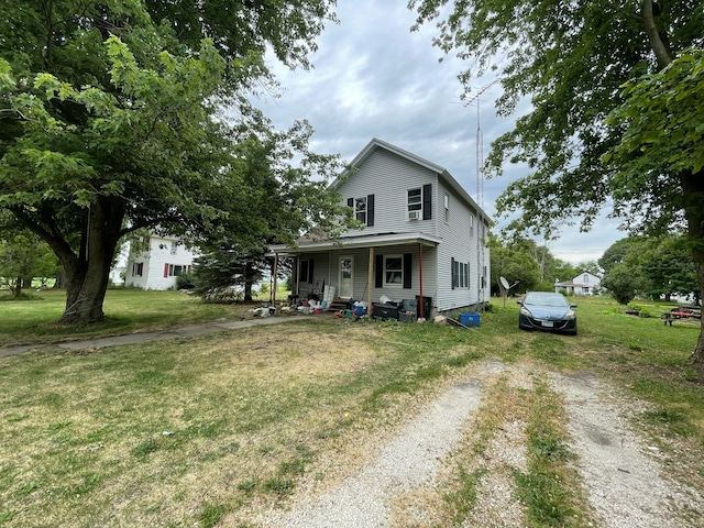 view of front of property with a front lawn