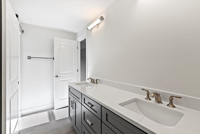 bathroom featuring tile patterned floors and vanity