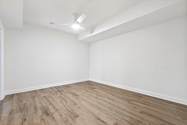 unfurnished room featuring light hardwood / wood-style flooring and ceiling fan