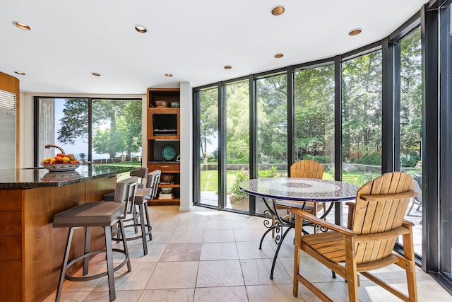 sunroom / solarium with plenty of natural light