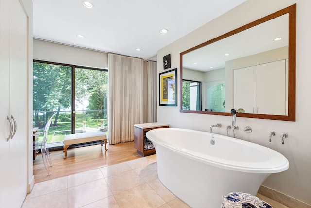 bathroom featuring a tub and wood-type flooring