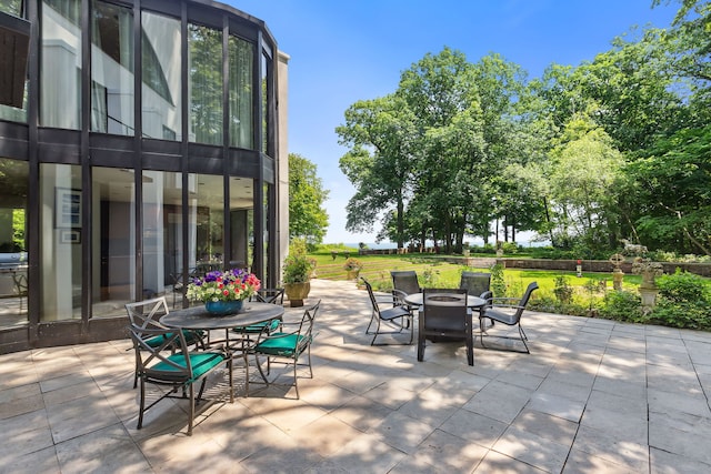 view of patio / terrace with a fire pit
