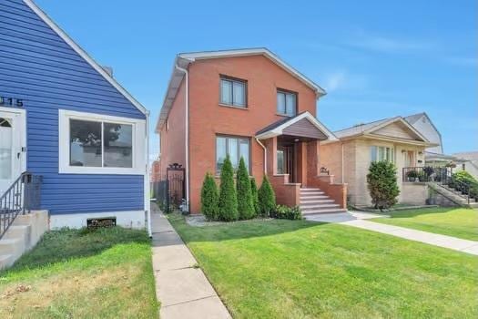 view of front facade featuring a front yard