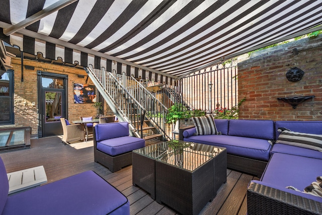 wooden deck with an outdoor hangout area