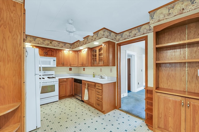 kitchen with ceiling fan, sink, and white appliances