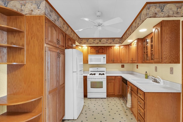 kitchen with white appliances, ceiling fan, and sink