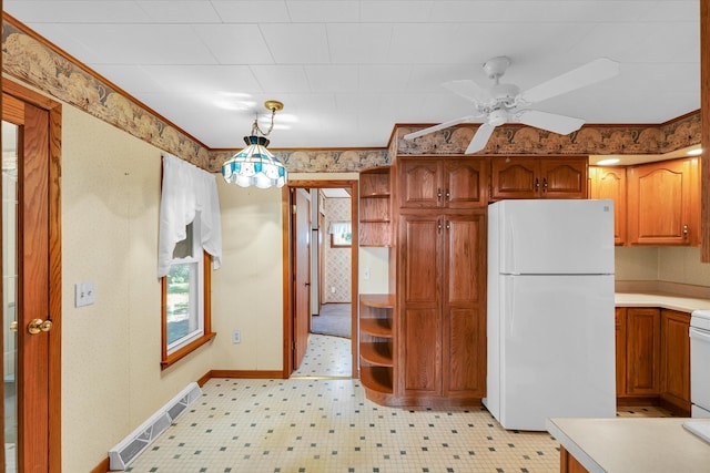 kitchen featuring white appliances, ceiling fan, and crown molding